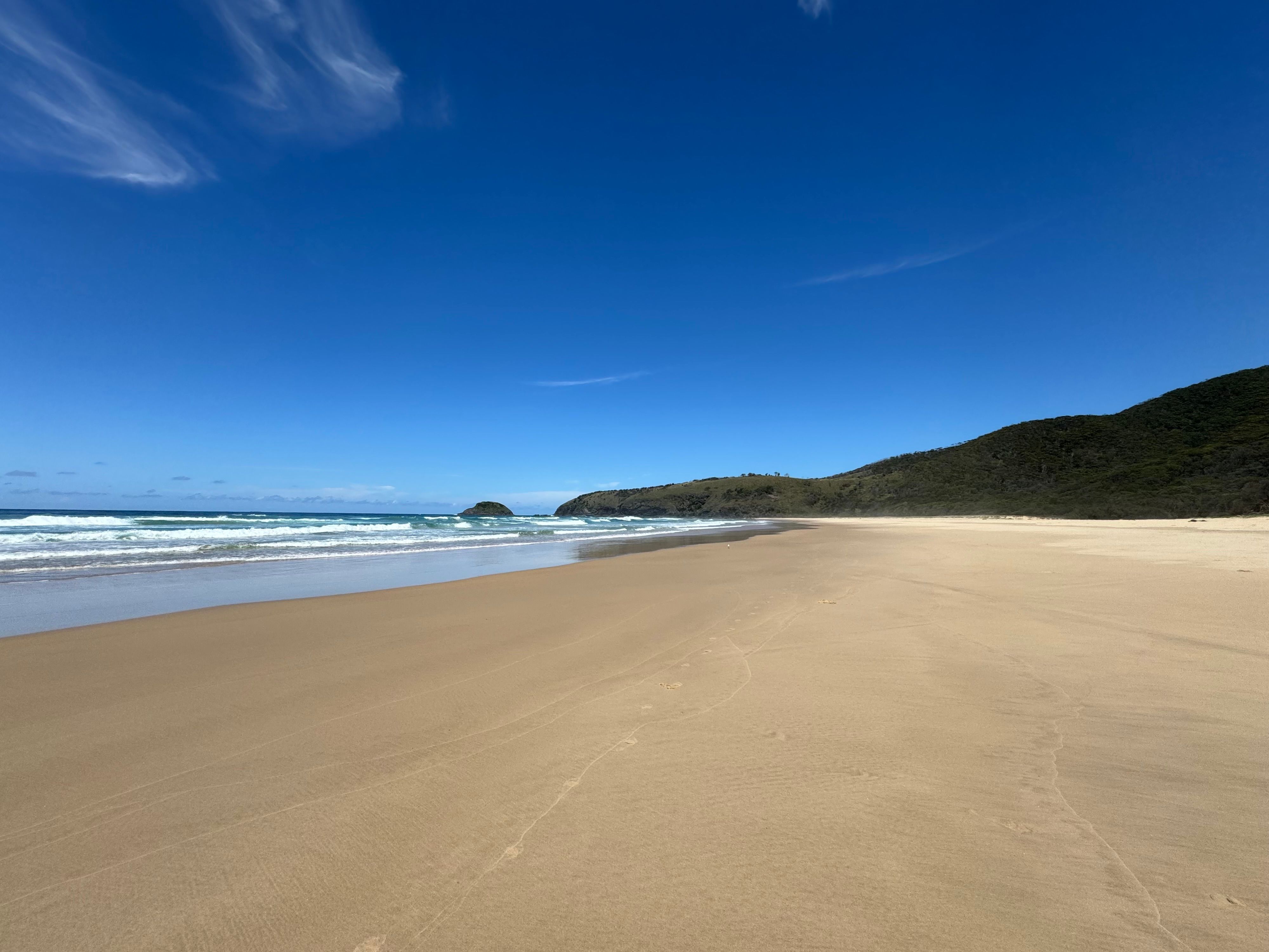 Wide Sandy Beach on Ocean Shore · Free Stock Photo