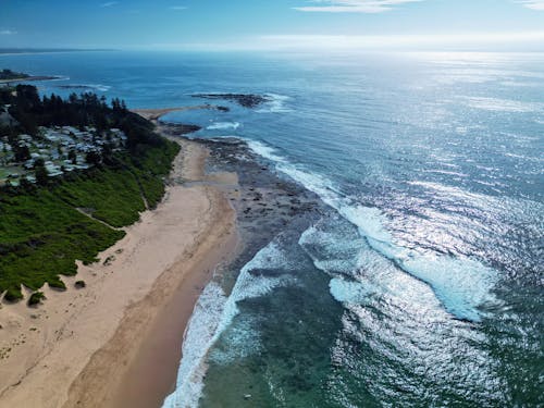 Waves on Ocean Shore in Birds Eye View