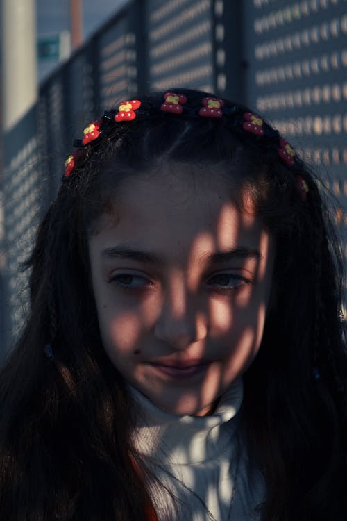 Free Shadows on Face of Girl with Hairband Stock Photo