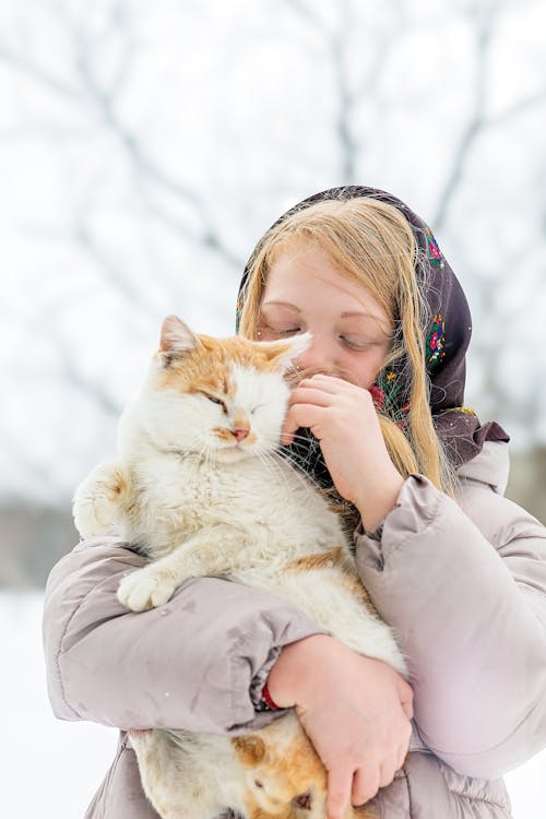 Portrait of a Woman Holding a Cat