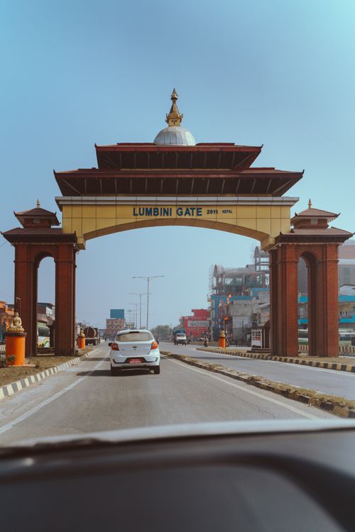 Gate In Road A view of a road with a gate in the middle · Free Stock Photo