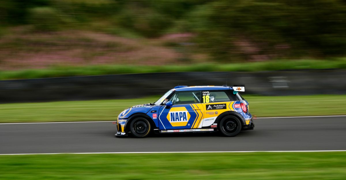 Racing Mini Cooper Speeding Around the Track · Free Stock Photo