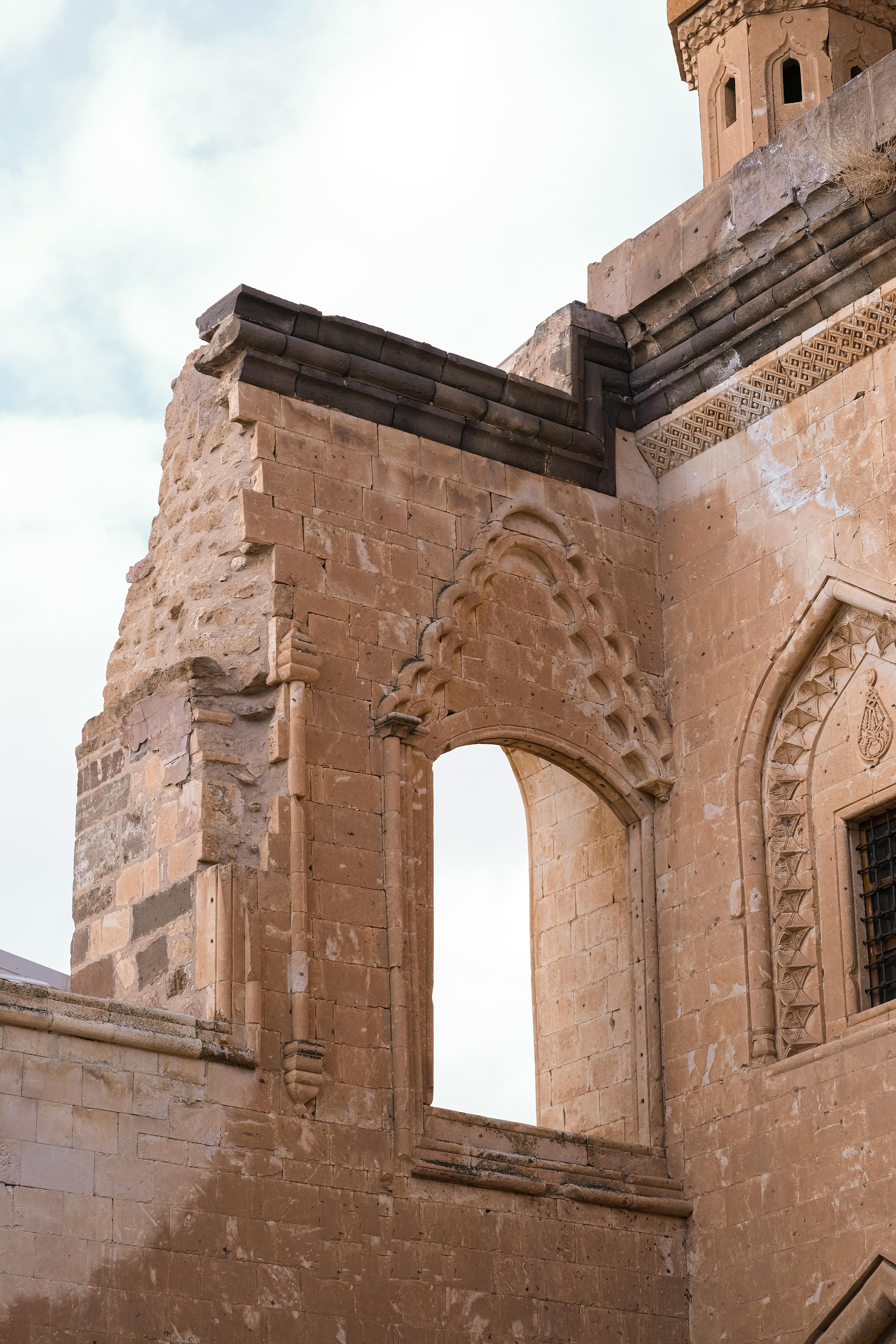 Intricate stonework detail of Ishak Pasha Palace, showcasing ancient architectural design.