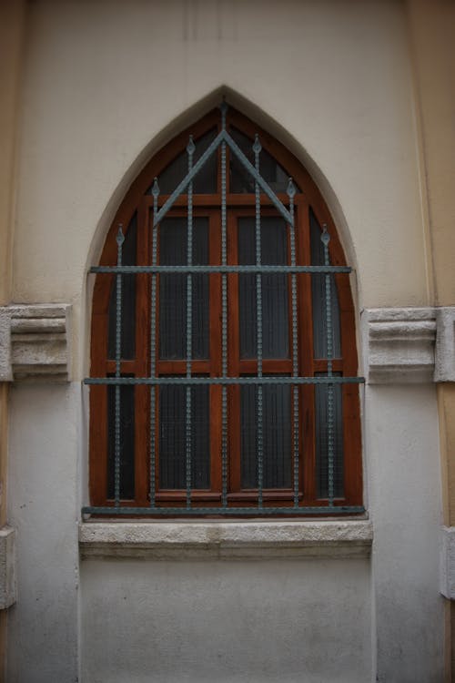 A window with bars on it and a window