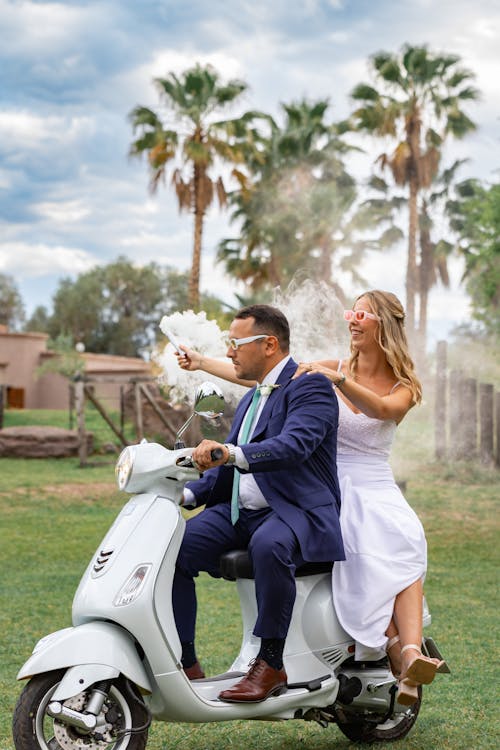 Groom with Bride on Scooter