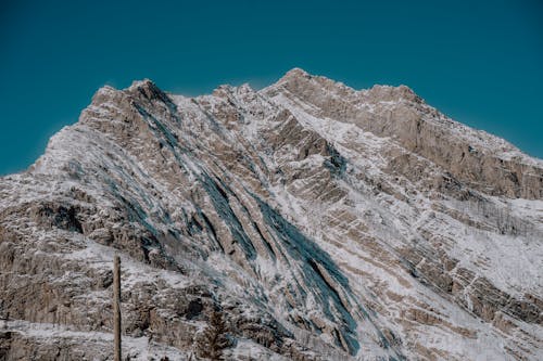 Rugged Mountainside Covered with Snow