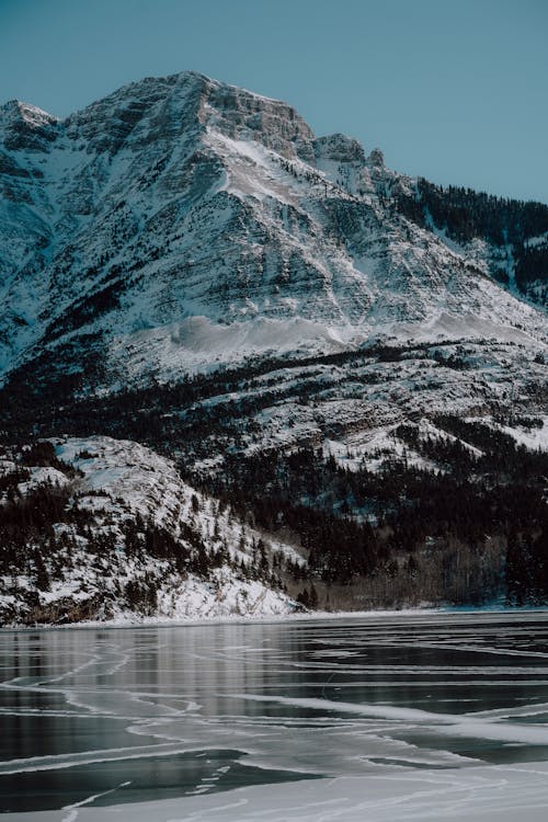 Steep Mountain Above a Frozen Lake