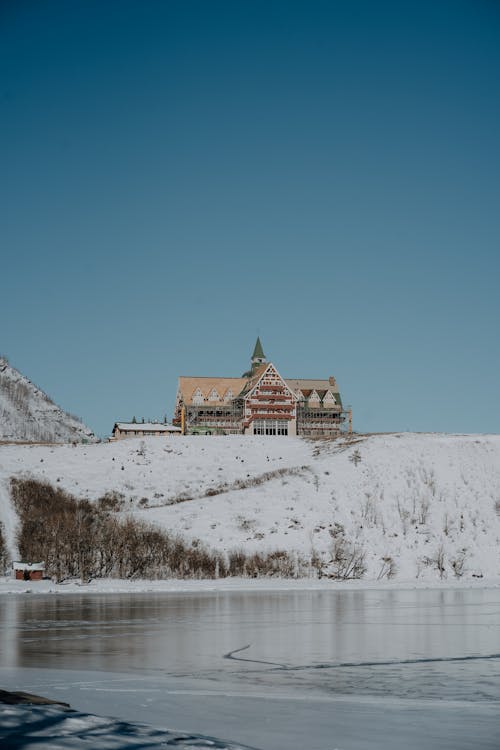 Hotel on a Hill by the Lake in Winter