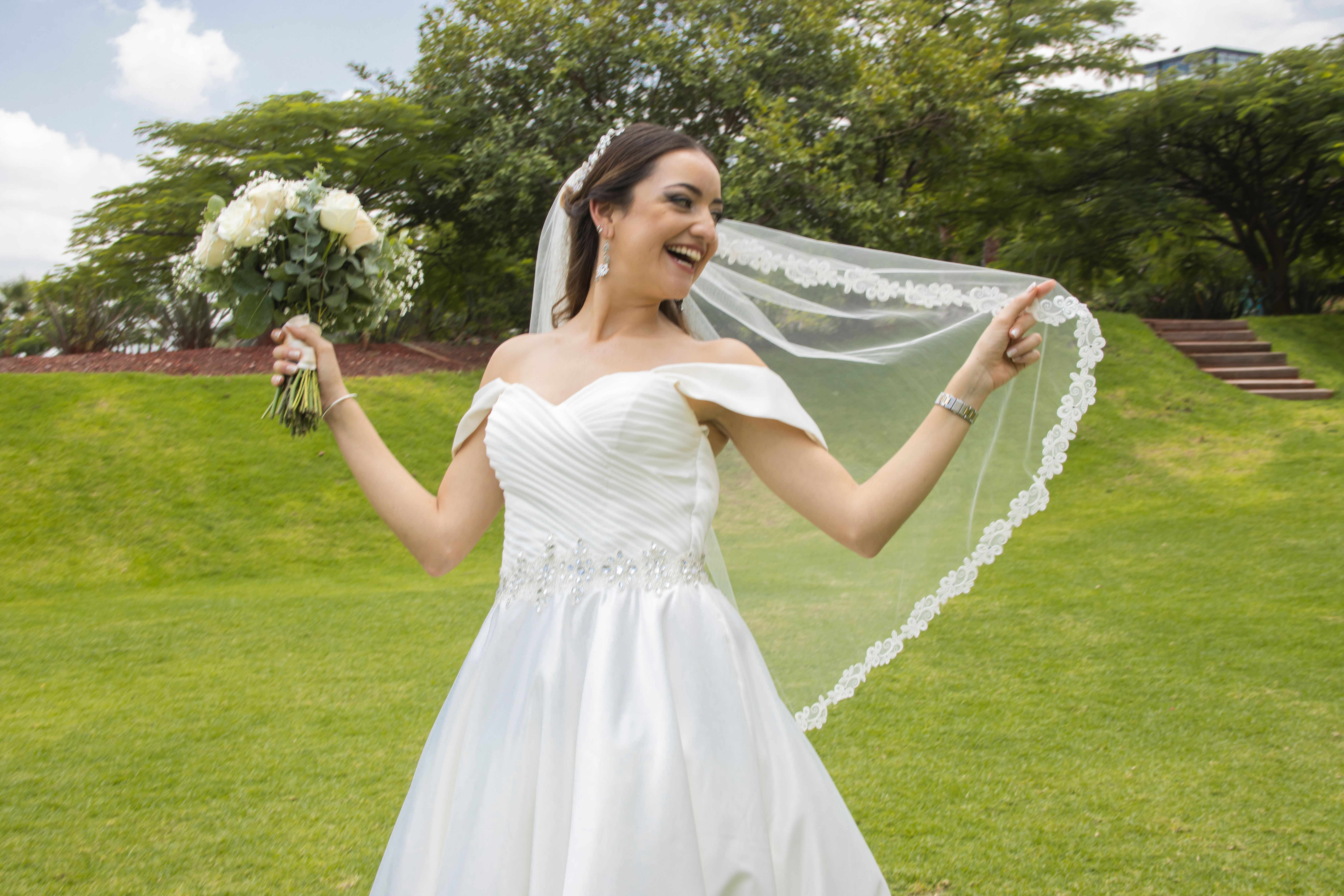 Portrait of Smiling Bride in Wedding Dress · Free Stock Photo