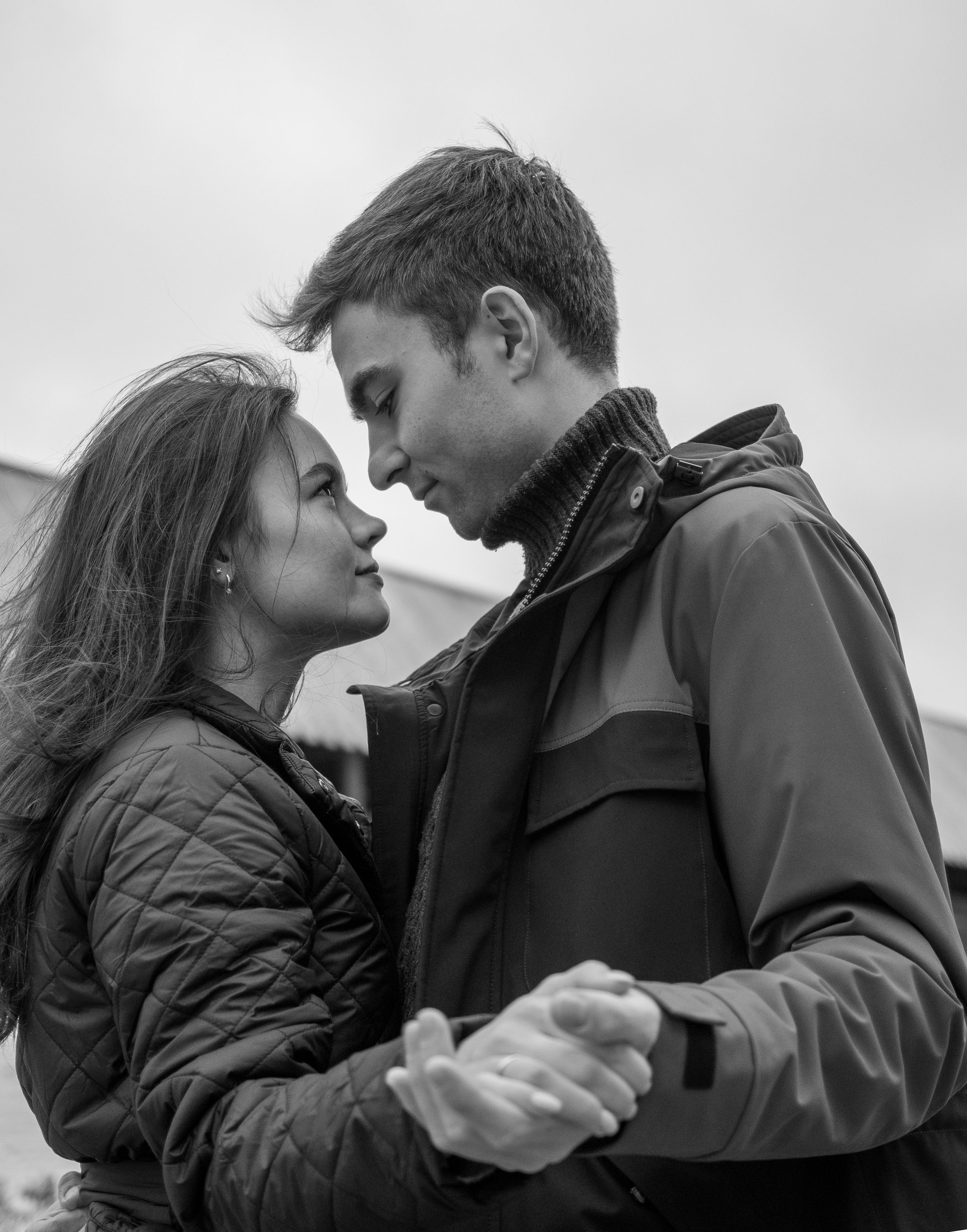 Black and White Photo of a Couple Holding Hands and Embracing · Free ...