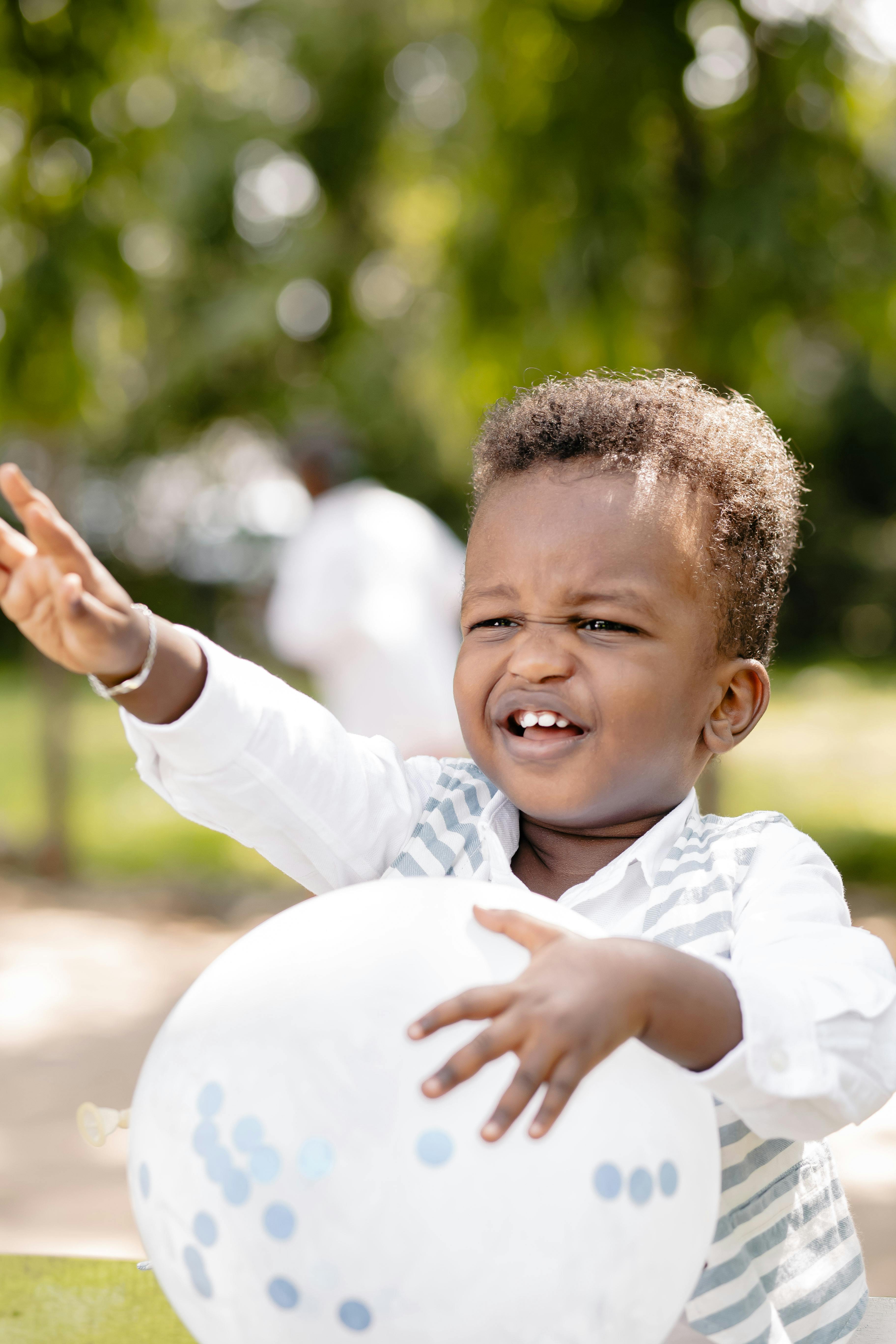 Smiling Boys with Goat Kid · Free Stock Photo
