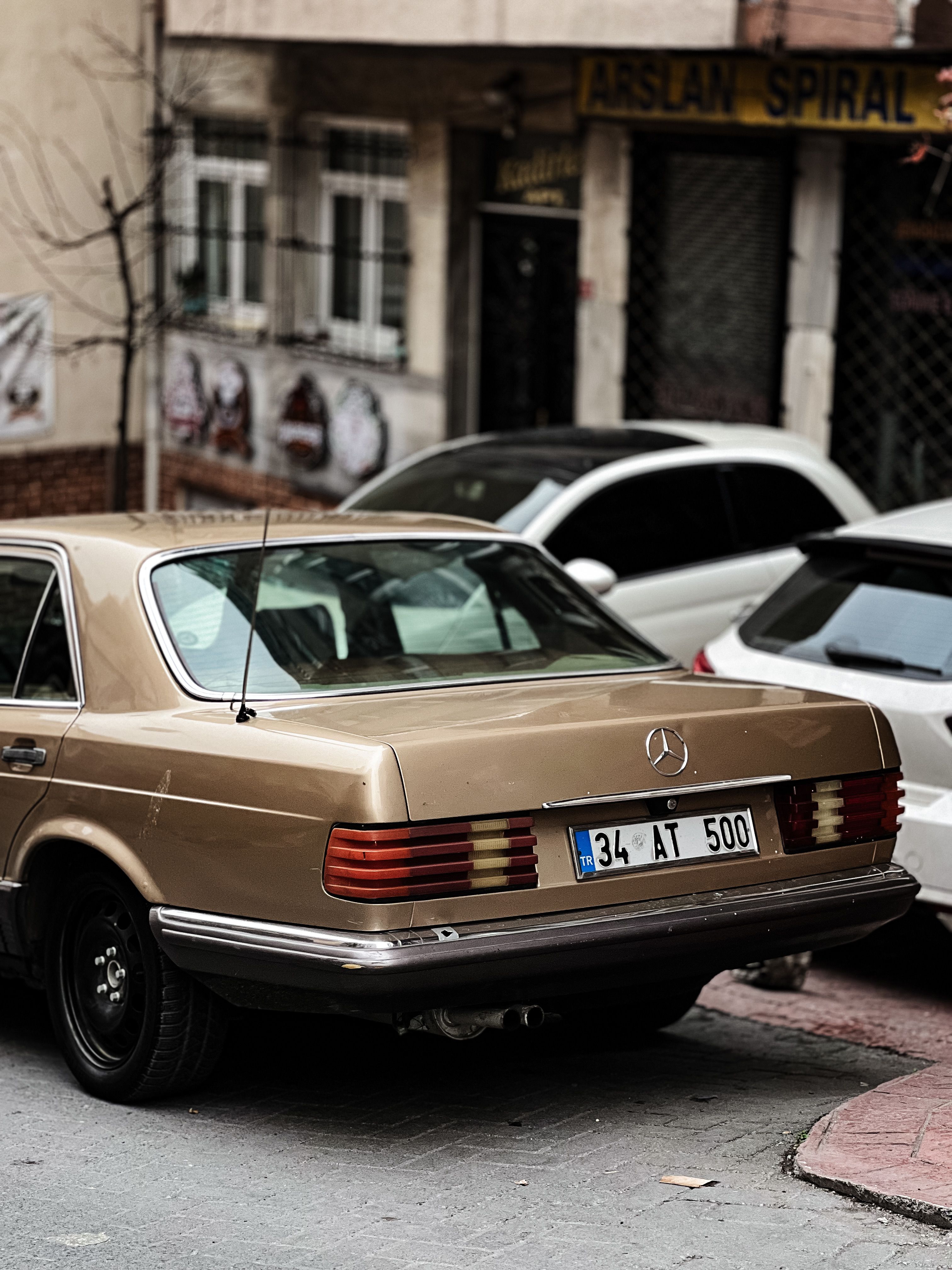 A Mercedes Car Parked on a Street · Free Stock Photo