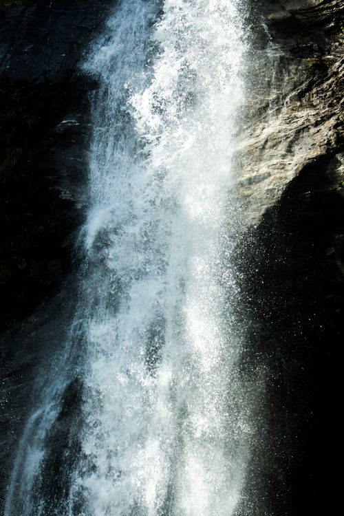 Free Stunning waterfall cascading down rocks, showcasing nature's beauty in Italy's Trentino region. Stock Photo