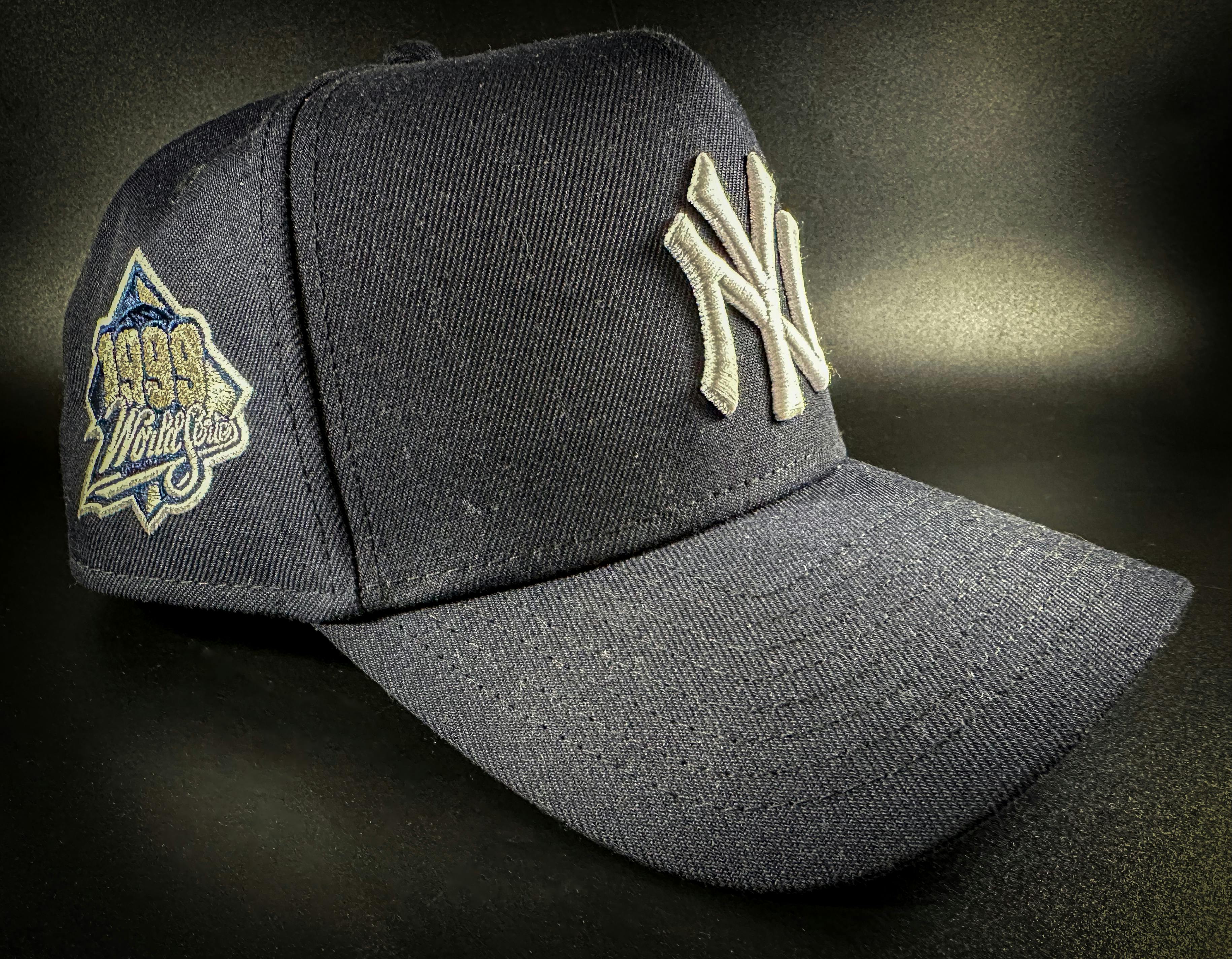 Close-up of a stylish New York baseball cap featuring a vivid NY logo and embroidery details.