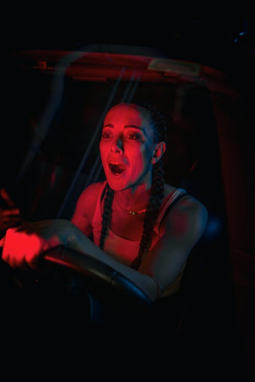 woman driving at night 