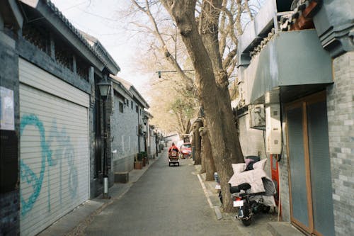 View of a Narrow Alley between Buildings in City 