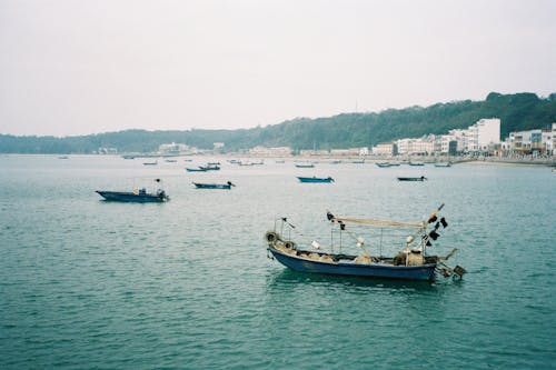 Fishing Boats in Town on Sea Coast