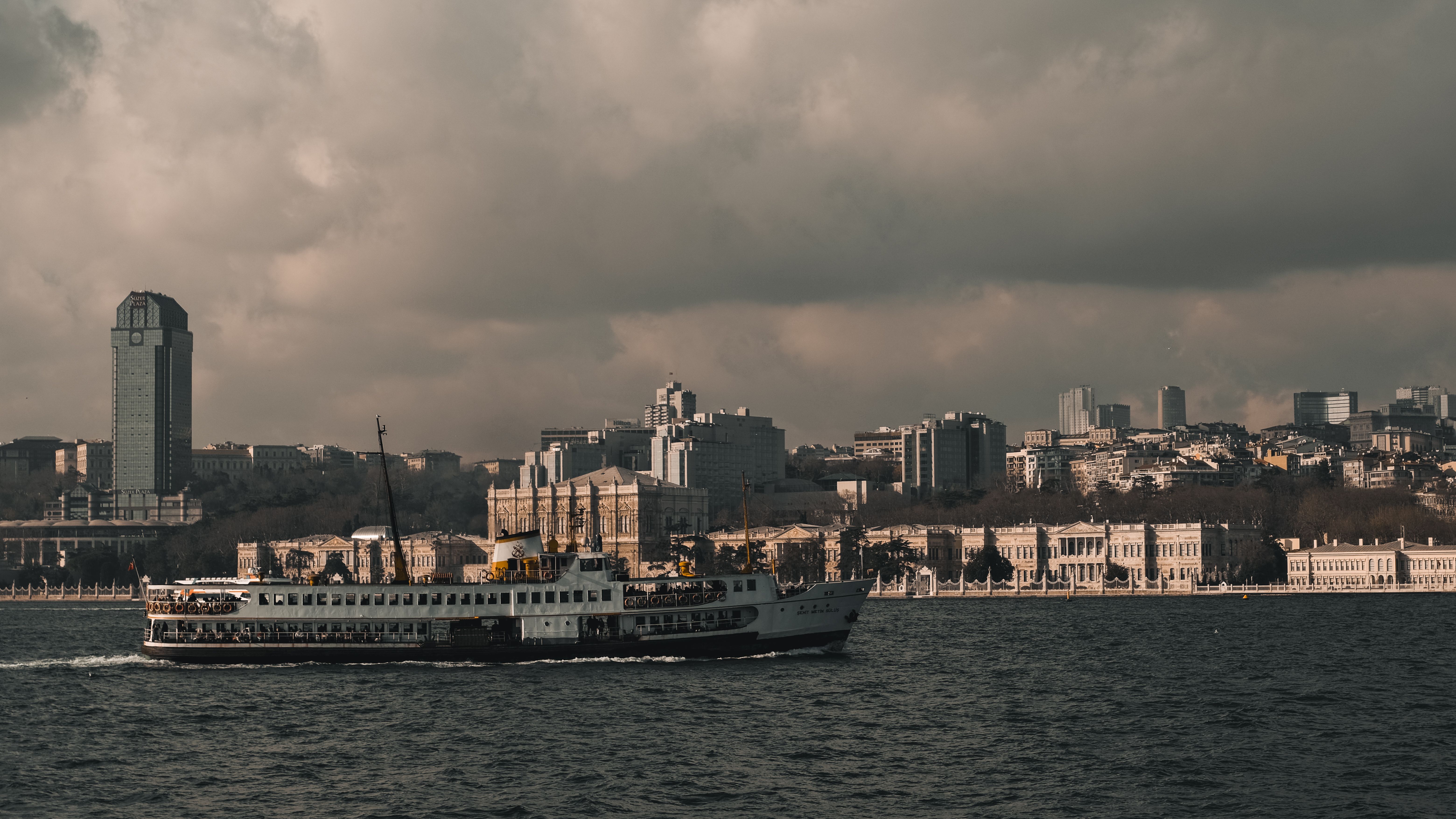 Photo of a Ferry Crossing the Bosphorus Strait in Istanbul under Dark ...