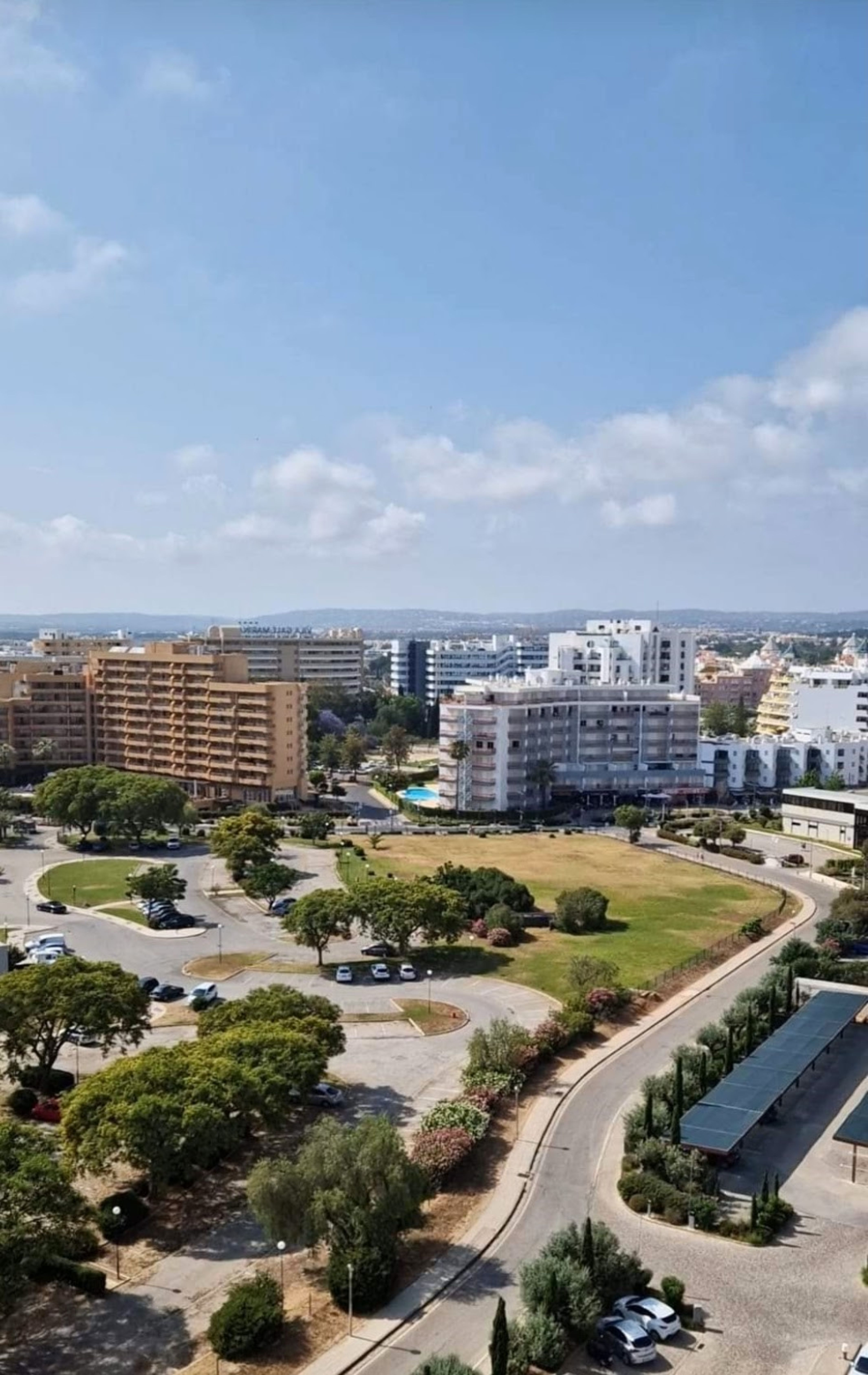 Aerial View of a Park and Modern Buildings in City · Free Stock Photo