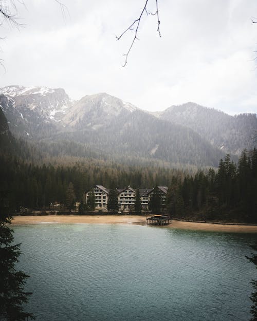 View of Waterfront Houses on the Shore of Lake Prags, Prags Dolomites in South Tyrol, Italy