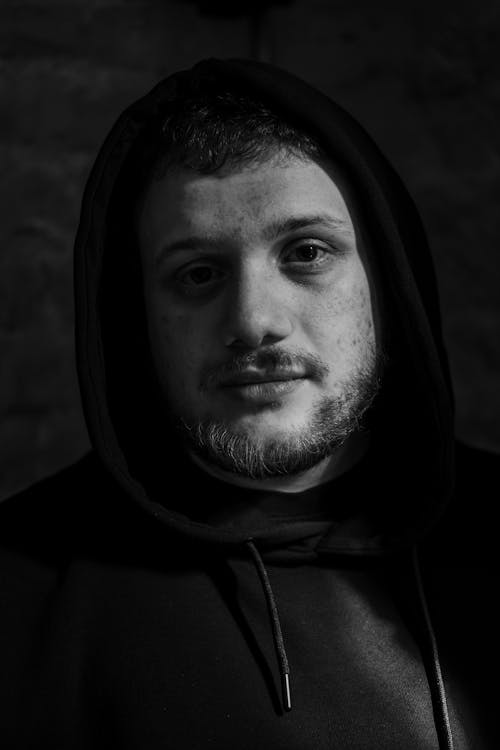 Portrait of a Man Wearing a Hoodie