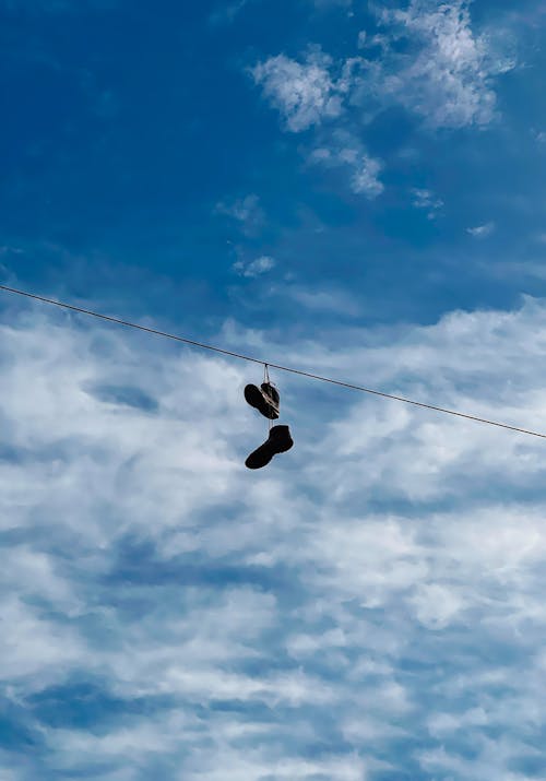 Free stock photo of blue sky, shoe in the sky, shoes