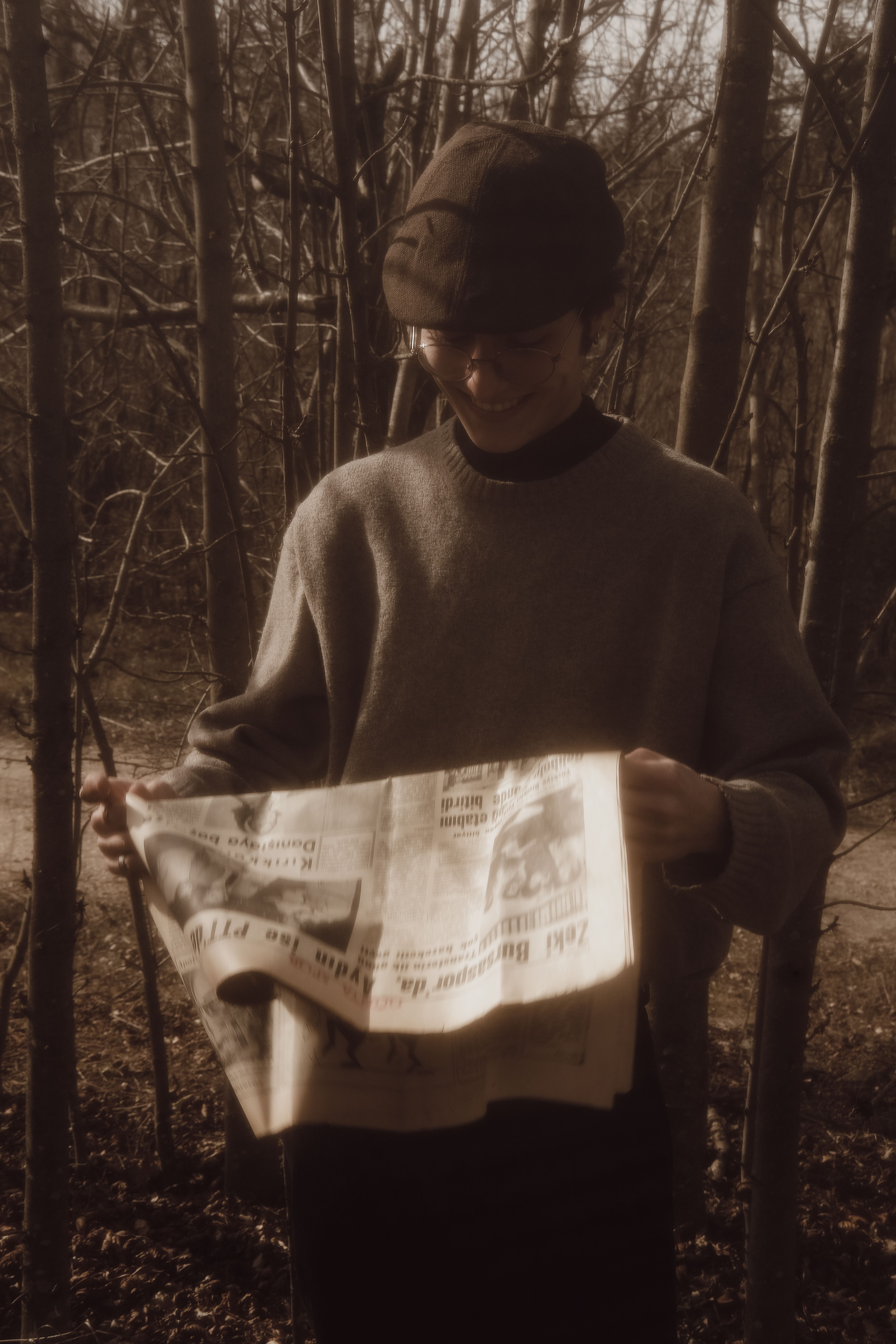 A Man Holding a Newspaper · Free Stock Photo