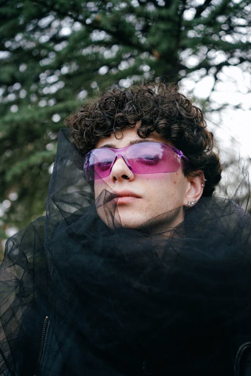 Portrait of Man in Veil and Pink Eyeglasses