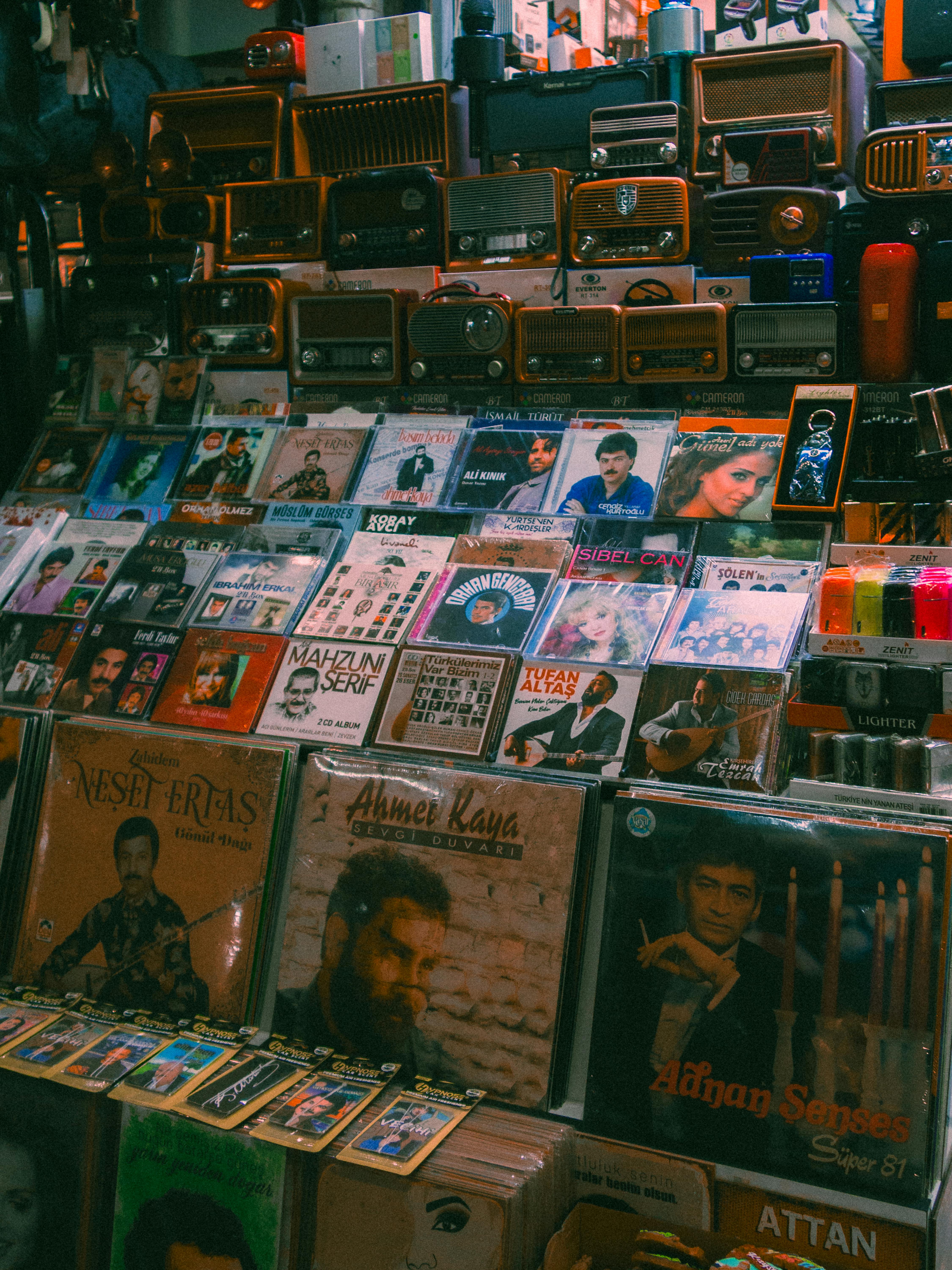 Retro display of vintage records and radios in a Ürgüp music shop.