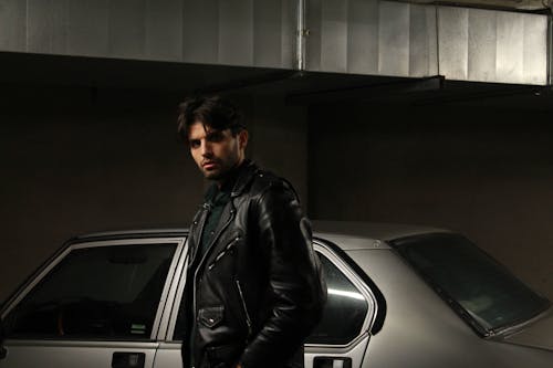 Brunette Man in Jacket Standing near Car