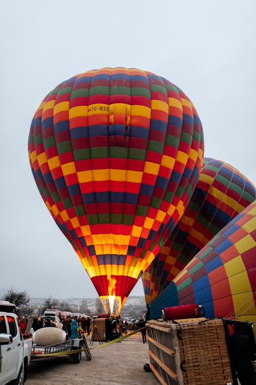 A hot air balloon is being inflated in the air