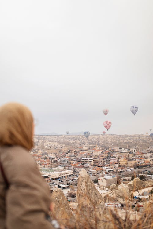 Hot Air Balloons Flying over City in Cappadocia