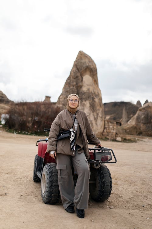 Woman Wearing Headscarf in Front of a Quad 