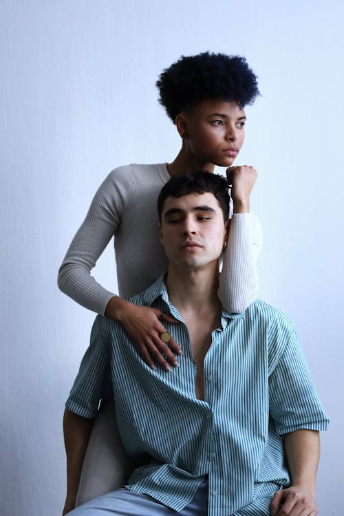 Multiracial Couple Posing in Studio