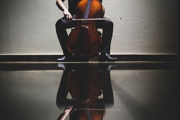 Person Playing Cello