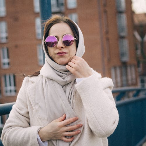 Woman in Sunglasses and Coat