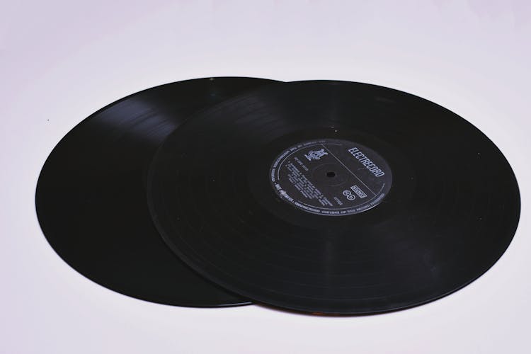 Close-up Photo Of Two Black Lp Vinyl Discs