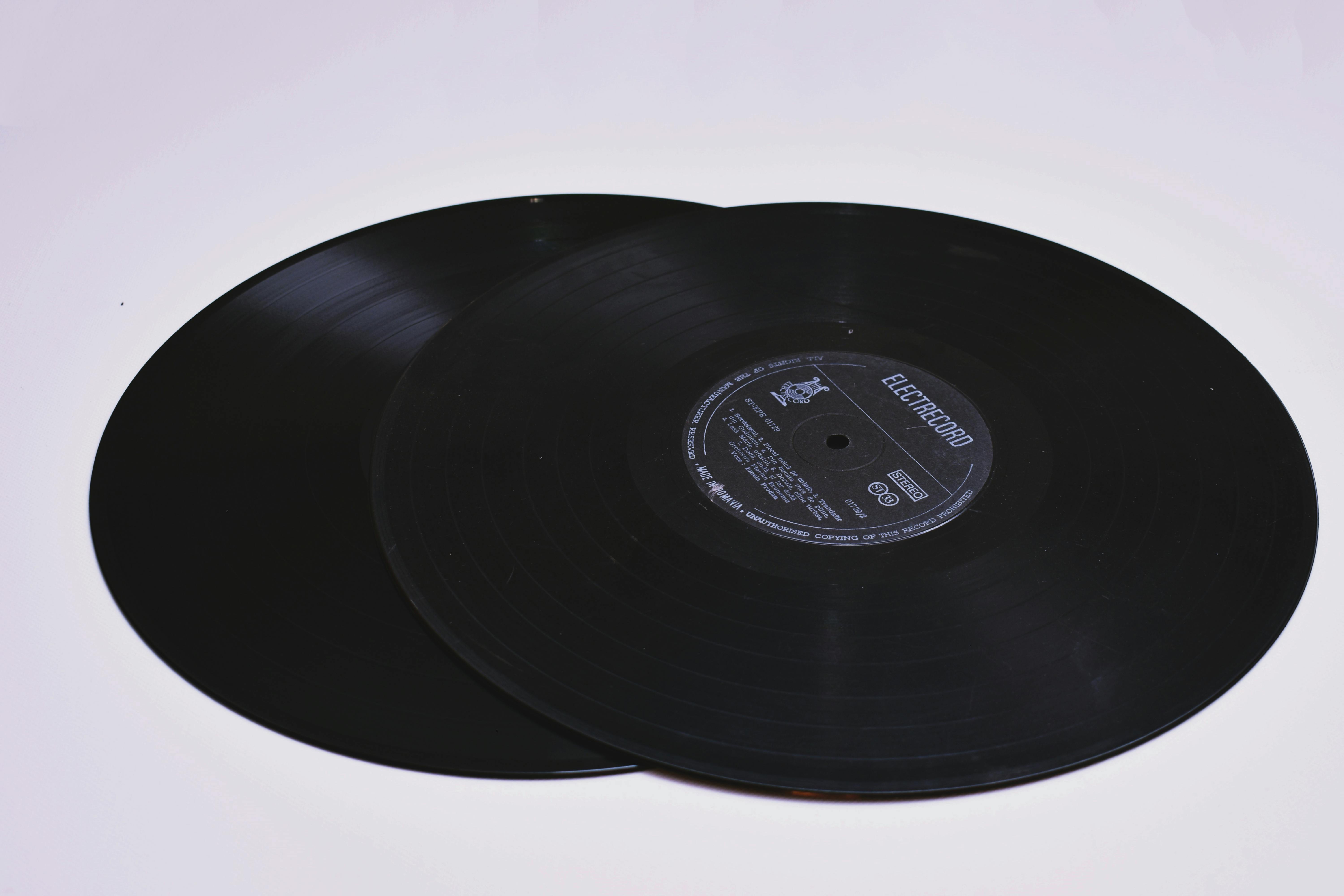 Closeup Photo of Two Black Lp Vinyl Discs · Free Stock Photo