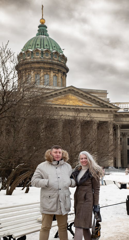 A Couple Standing on the Background of the Kazan Cathedral, St Petersburg, Russia 