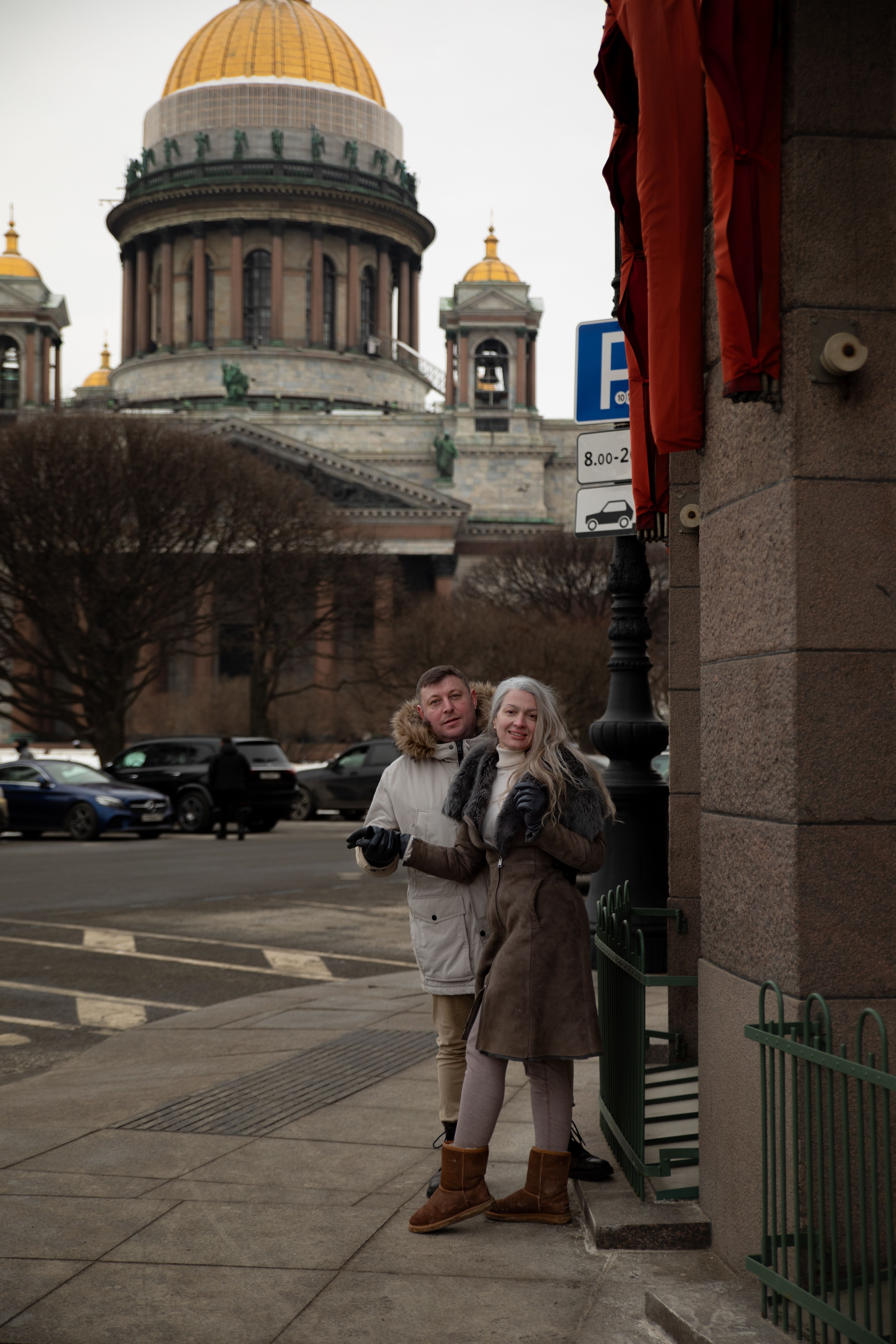 Two women standing on the sidewalk in front of a building · Free Stock ...
