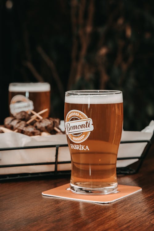 Close-up of Beers and Food on a Table in a Restaurant 