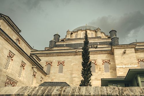 Free Captivating low angle view of a historic mosque in Istanbul, showcasing its intricate architecture. Stock Photo