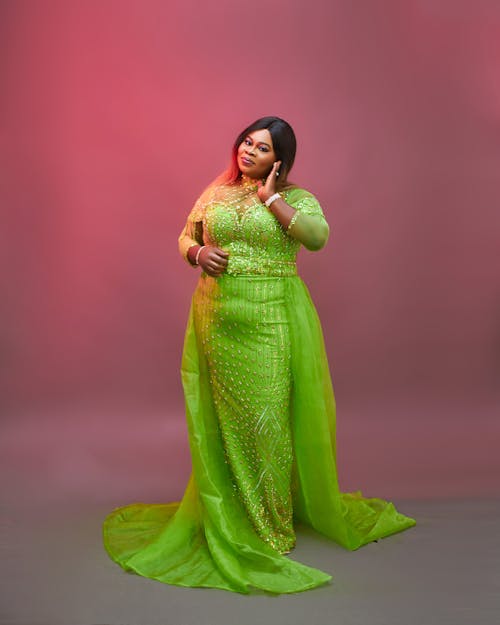 Woman Posing In a Long Green Dress