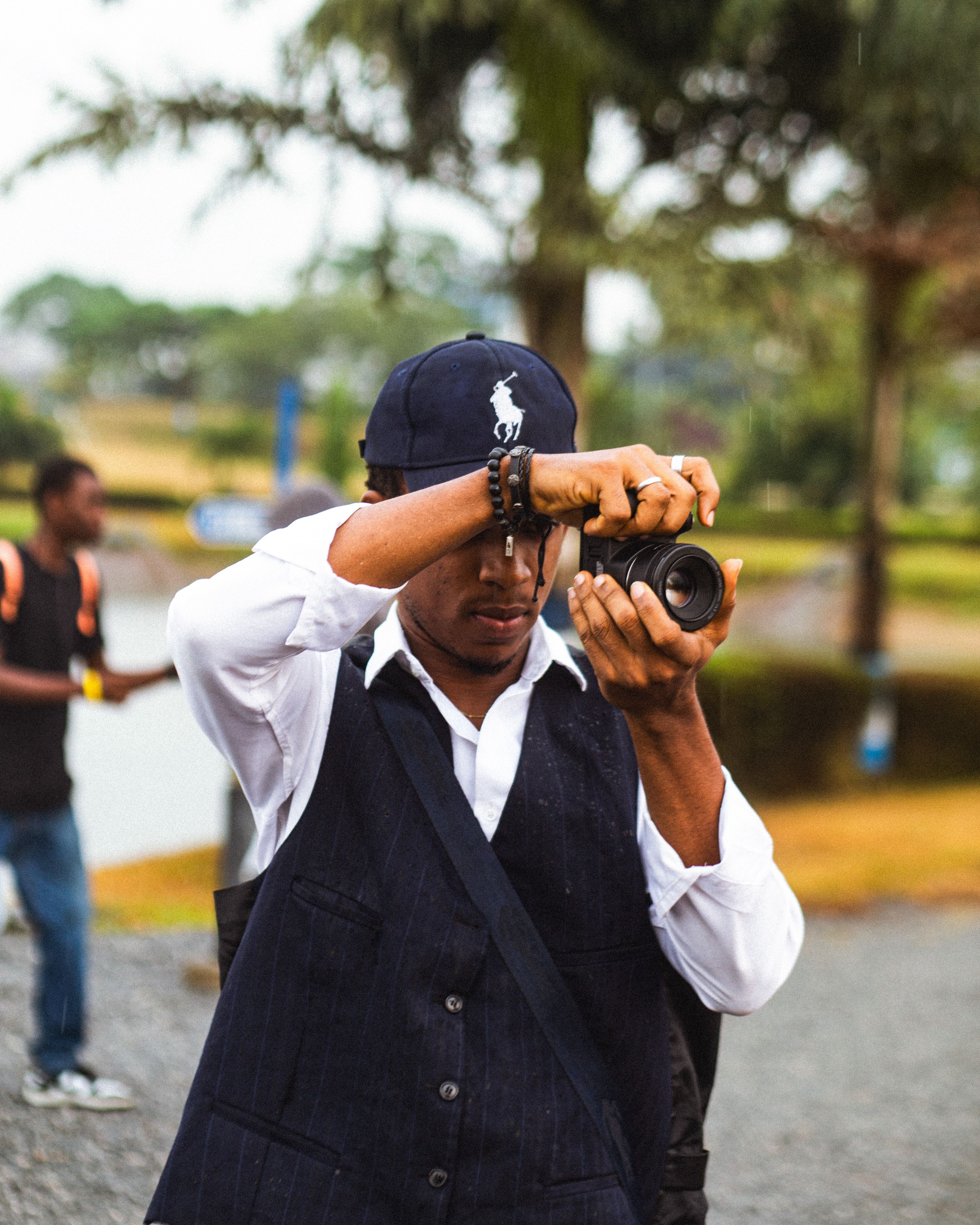 Young black man taking photos outdoors in Port Harcourt, Nigeria