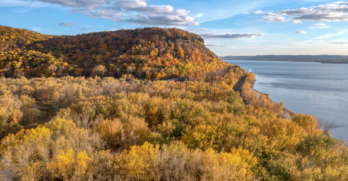Beautiful fall foliage in Stockholm, WI with a stunning view of Lake Pepin and colorful forests.