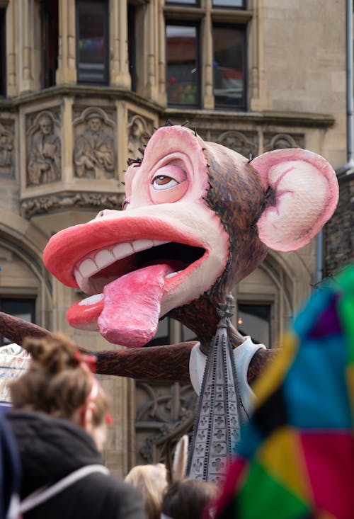 A large puppet with a large tongue sticking out