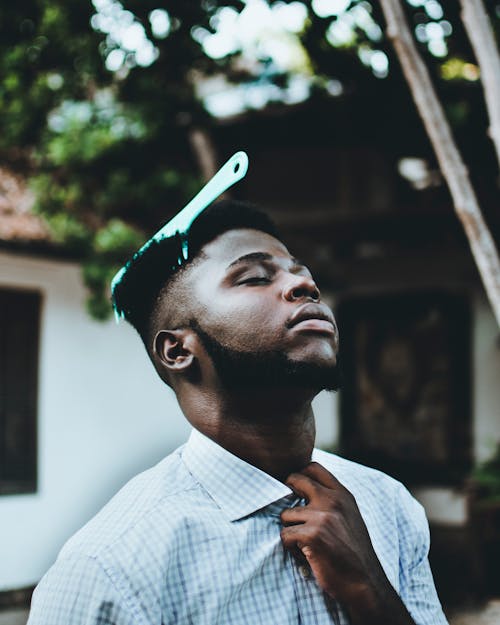 Man Wearing White Button-up Collared Shirt