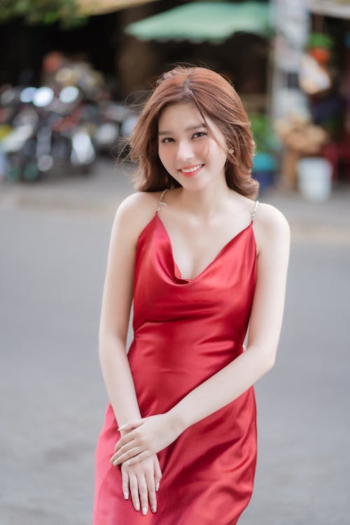 Smiling Woman in Red Dress