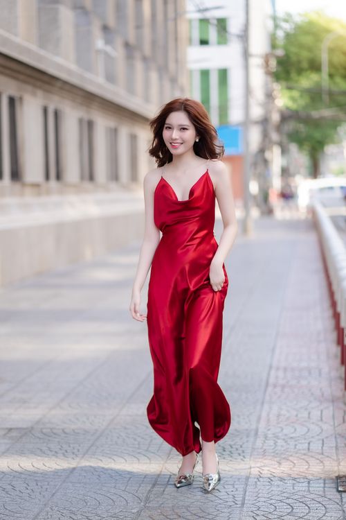 woman in silk dress Young Woman Posing in a Silk Slip Dress · Free Stock Photo
