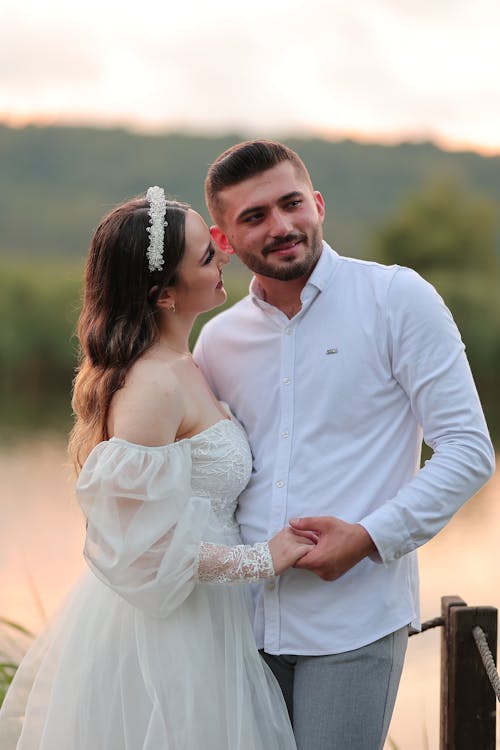 Portrait of Newlyweds Holding Hands